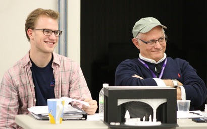 Paul Barnes and Conner Wilson behind the table